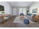 Comfortable living room with stylish furniture, wood floors, and ample space at 340 Onyx Ct, Atlanta, GA 30349