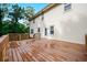 A spacious newly installed back deck can be accessed via a door on the side of the home's exterior at 3664 Nessa Se Ct, Smyrna, GA 30082