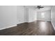 This bedroom features wood-look flooring, neutral walls, and a ceiling fan for added comfort at 3664 Nessa Se Ct, Smyrna, GA 30082
