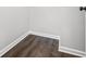 Bedroom walk-in closet featuring hardwood flooring and base trim at 3664 Nessa Se Ct, Smyrna, GA 30082