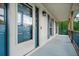Inviting front porch featuring classic details and ample space for relaxing, enhancing the home's charm at 3664 Nessa Se Ct, Smyrna, GA 30082