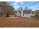 Wide view of the backyard with a brick patio at 954 Josie Ct, Lawrenceville, GA 30045