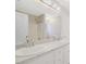Bright bathroom with double sinks, granite countertop, and decorative lighting at 954 Josie Ct, Lawrenceville, GA 30045