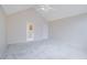 Spacious bedroom with neutral walls, plush carpet, and an ensuite bathroom at 954 Josie Ct, Lawrenceville, GA 30045