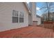 Exterior view of a home showing the deck and chimney at 954 Josie Ct, Lawrenceville, GA 30045