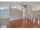 Open-concept living area featuring hardwood floors, high ceilings, and elegant lighting at 954 Josie Ct, Lawrenceville, GA 30045