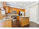 Well-equipped kitchen with stainless steel appliances, granite countertops, and ample lighting at 2252 Limehurst Ne Dr, Atlanta, GA 30319