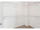 Walk-in closet with multiple shelves for optimized storage at 2252 Limehurst Ne Dr, Atlanta, GA 30319