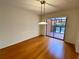 Cozy dining room featuring hardwood floors and a sliding door to the patio at 2259 Pernoshal Ct, Dunwoody, GA 30338