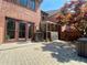 Brick home exterior featuring french doors, a patio and an enclosed sunroom at 2259 Pernoshal Ct, Dunwoody, GA 30338
