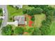 Spacious two-story home with a well-manicured lawn, a variety of trees, and lush shrubbery, adding charm and privacy at 3120 Caney Creek Ln, Cumming, GA 30041