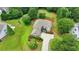 Elegant two-story home boasting lush landscaping, a well-kept lawn, and a concrete driveway for added curb appeal at 3120 Caney Creek Ln, Cumming, GA 30041