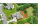 Aerial view of a landscaped backyard and beautiful neighborhood at 3120 Caney Creek Ln, Cumming, GA 30041