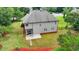 A spacious backyard with lush green grass, and mature trees surrounding the perimeter of the property at 3120 Caney Creek Ln, Cumming, GA 30041
