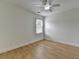Light and bright bedroom with wood floors and natural light at 3120 Caney Creek Ln, Cumming, GA 30041