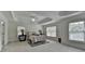 Spacious bedroom with tray ceiling, carpet flooring, two windows and stylish lamps at 3120 Caney Creek Ln, Cumming, GA 30041