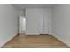 Spacious bedroom with wood floors and bright, natural light at 3120 Caney Creek Ln, Cumming, GA 30041