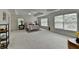 Spacious bedroom with tray ceiling, carpet flooring, two windows and stylish lamps at 3120 Caney Creek Ln, Cumming, GA 30041