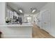 Updated kitchen with white countertops, stainless steel appliances and open-concept design at 3120 Caney Creek Ln, Cumming, GA 30041