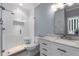 Modern bathroom with glass shower, white vanity, and stone countertop offering a luxurious feel at 5860 Stoneleigh Dr, Suwanee, GA 30024