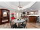 Finished basement featuring a bar, dining area, and wine cellar with stylish tile flooring at 5860 Stoneleigh Dr, Suwanee, GA 30024
