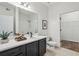 Bathroom features a large mirror, and a view into the walk-in closet at 2700 Pine Tree Ne Rd # 1208, Atlanta, GA 30324