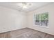 This bedroom is bright with a window that overlooks the balcony at 2700 Pine Tree Ne Rd # 1208, Atlanta, GA 30324