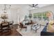 Bright living room with hardwood floors, modern furnishings, and lots of natural light at 2700 Pine Tree Ne Rd # 1208, Atlanta, GA 30324
