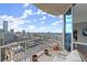 Spacious balcony offering stunning skyline views, ideal for relaxing or entertaining al fresco at 400 W Peachtree Nw St # 3611, Atlanta, GA 30308
