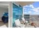 Enjoy stunning city views from this private balcony with comfortable seating at 400 W Peachtree Nw St # 3611, Atlanta, GA 30308