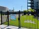 Well-maintained dog park with artificial turf and playful paw print designs at 400 W Peachtree Nw St # 3611, Atlanta, GA 30308