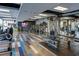 Modern gym with fitness equipment and a TV for residents' enjoyment at 400 W Peachtree Nw St # 3611, Atlanta, GA 30308