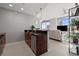Open-concept kitchen with a breakfast bar that flows into the living room, creating a connected and inviting space at 400 W Peachtree Nw St # 3611, Atlanta, GA 30308