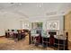 Community lounge area with bar seating and TV screens for residents' enjoyment at 400 W Peachtree Nw St # 3611, Atlanta, GA 30308