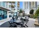 Community patio with outdoor seating and a barbecue area for social gatherings at 400 W Peachtree Nw St # 3611, Atlanta, GA 30308