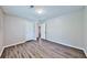 Inviting bedroom with wood-look flooring and neutral walls offering a blank canvas at 5666 Goldfield Dr, Acworth, GA 30102