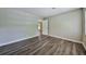 Neutral bedroom with vinyl plank floors and freshly painted walls is move-in ready at 5666 Goldfield Dr, Acworth, GA 30102