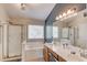 Spacious bathroom with double vanity, walk-in shower, and separate tub at 1370 Stoney Field Place, Lawrenceville, GA 30043