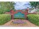 Attractive community sign for Bailey Farms, surrounded by colorful flowers and manicured landscaping at 1370 Stoney Field Place, Lawrenceville, GA 30043