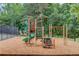 Charming neighborhood playground with slides, swings, and climbing structures provides safe outdoor fun at 1370 Stoney Field Place, Lawrenceville, GA 30043