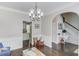Versatile room with hardwood floors offers flexible space for various activities and Gathering enjoyment at 1370 Stoney Field Place, Lawrenceville, GA 30043