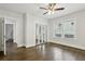 Bedroom featuring hardwood floors, natural light, and closet at 1667 Sylvan Sw Rd, Atlanta, GA 30310
