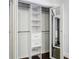 Walk-in closet featuring built-in storage shelves and drawers at 1667 Sylvan Sw Rd, Atlanta, GA 30310