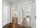 Hallway with hardwood floors leading to rooms with bathroom, living room, and Primary bedroom at 1667 Sylvan Sw Rd, Atlanta, GA 30310