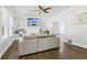 Comfortable living room featuring a fireplace, built-in shelves, and hardwood floors at 1667 Sylvan Sw Rd, Atlanta, GA 30310
