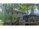 Back exterior of home featuring gray siding and back deck perfect for entertaining at 2859 Wood Park Nw Trce, Kennesaw, GA 30152
