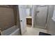 Functional bathroom with a shower, tub, and access to the vanity area at 2859 Wood Park Nw Trce, Kennesaw, GA 30152