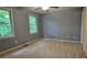 Neutral bedroom featuring windows, carpet and a closet at 2859 Wood Park Nw Trce, Kennesaw, GA 30152