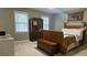 Bedroom with natural light, carpet, and antique furnishings, creating a cozy atmosphere at 2859 Wood Park Nw Trce, Kennesaw, GA 30152