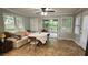 Bright breakfast nook with large windows and sliding glass doors leading to an outdoor deck at 2859 Wood Park Nw Trce, Kennesaw, GA 30152